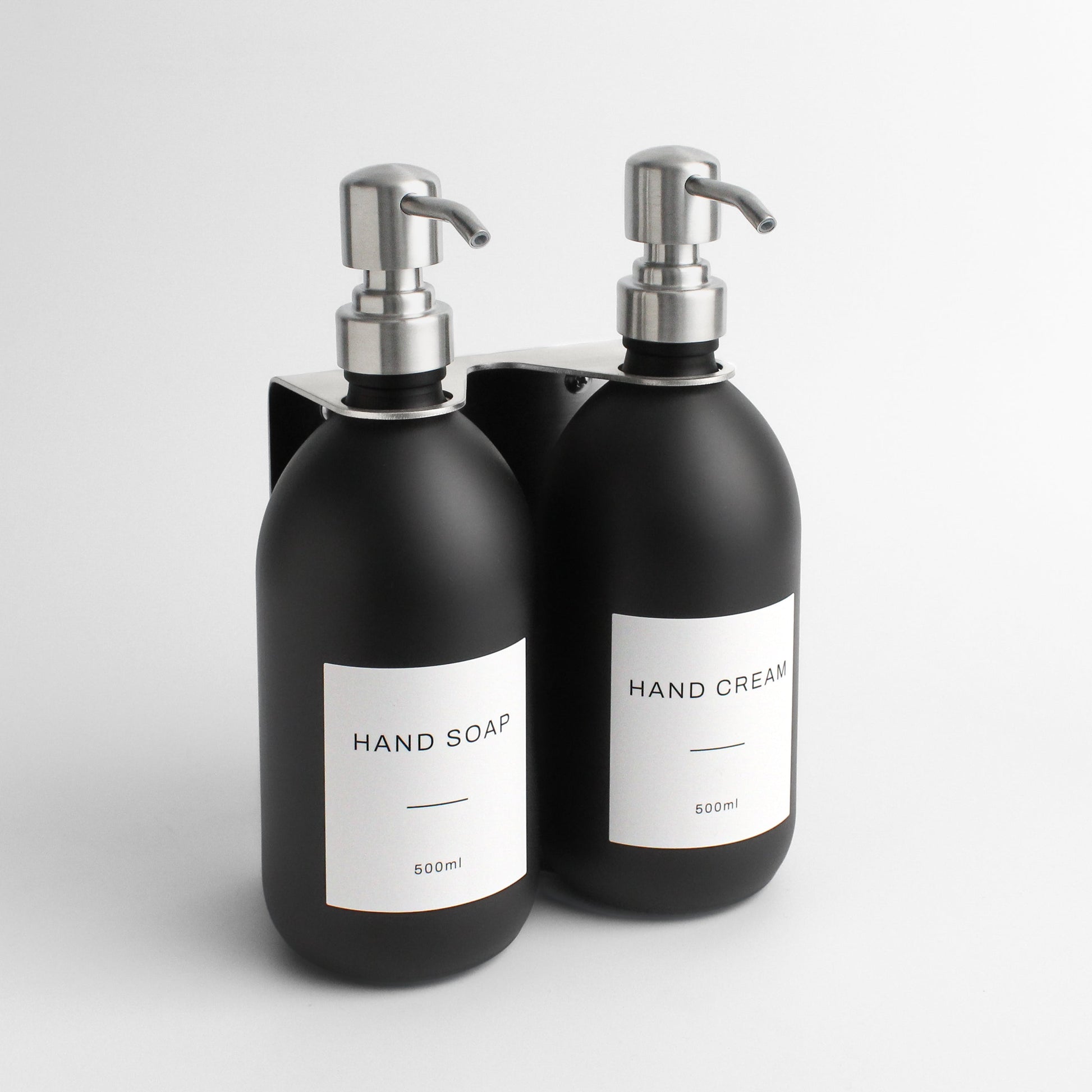 Namie Silver Wall Mounted Dispenser Bracket Set with Matte Black Bottles