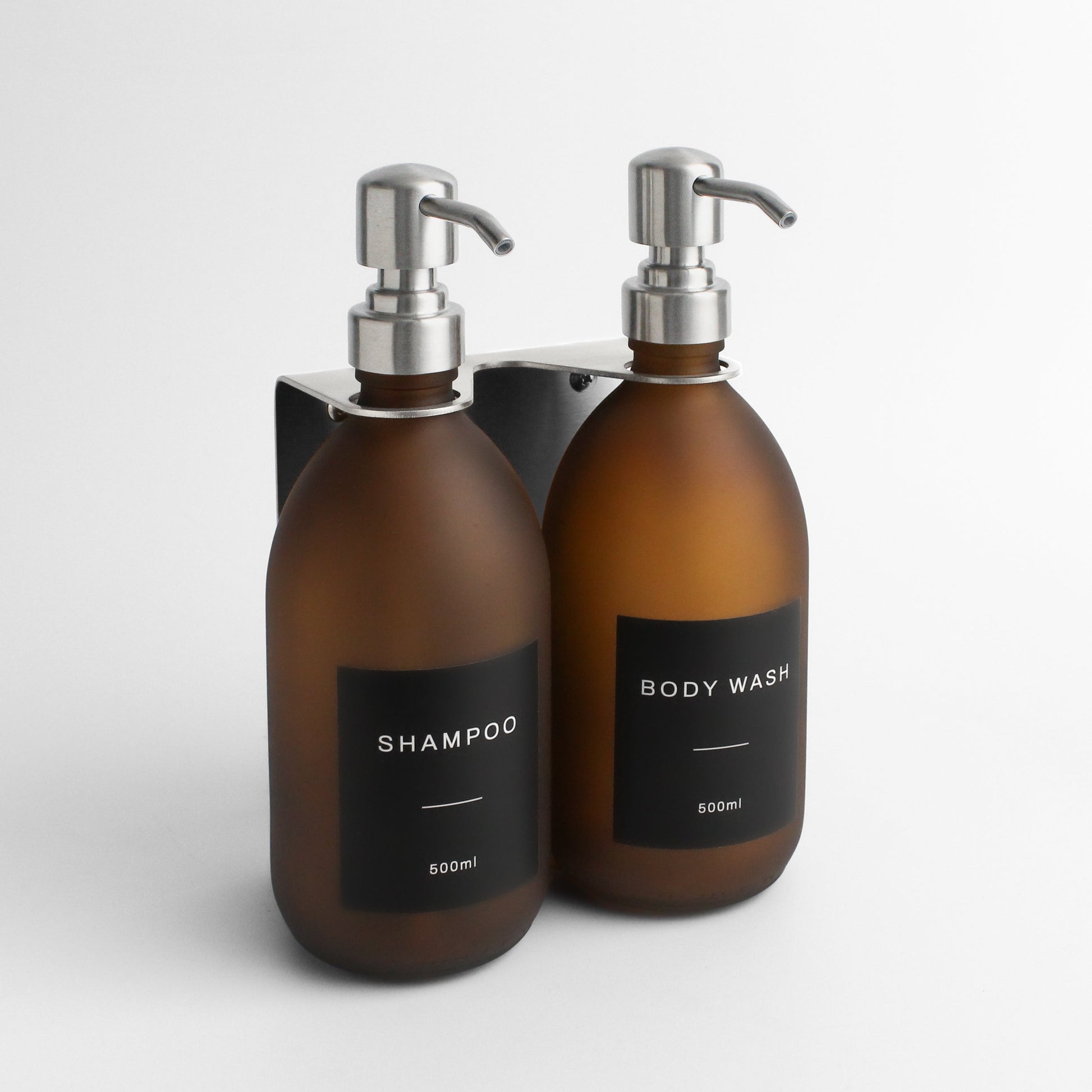 Namie Silver Wall Mounted Dispenser Bracket Set with Frosted Amber Glass Bottles