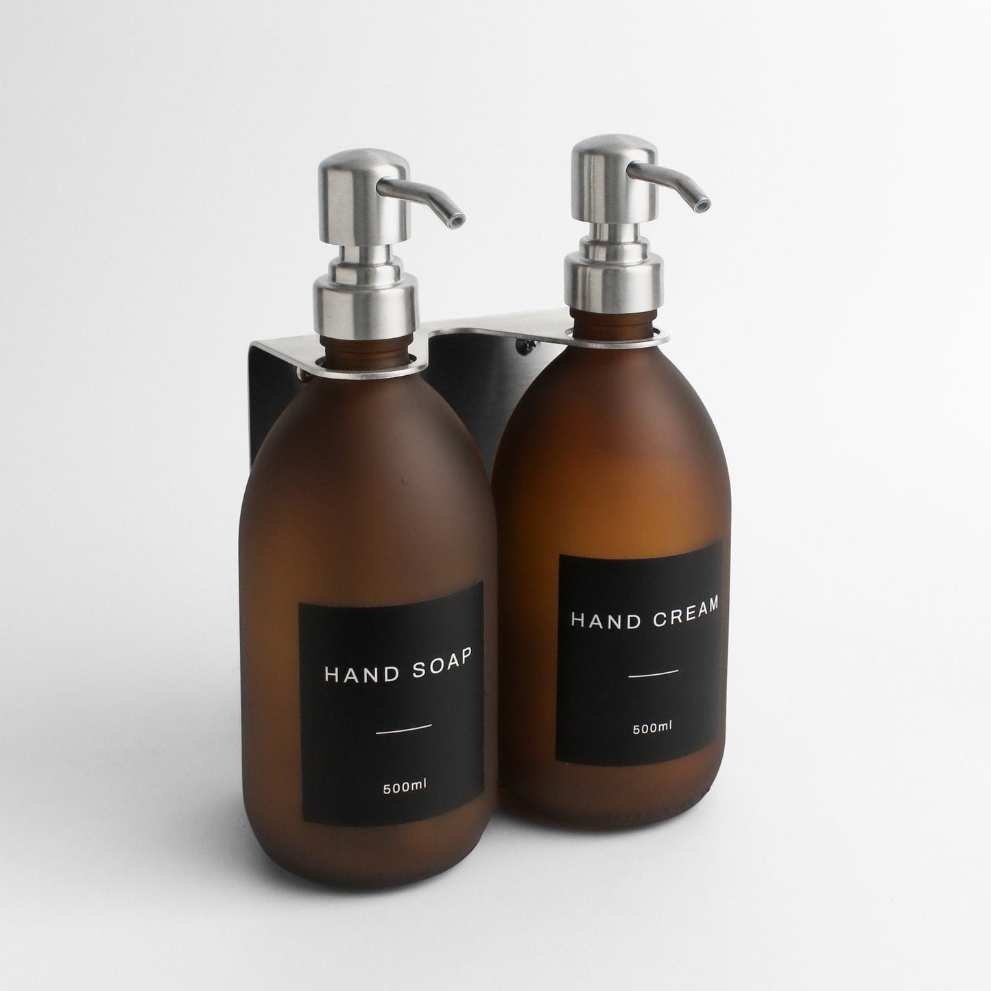 Namie Silver Wall Mounted Dispenser Bracket Set with Frosted Amber Glass Bottles