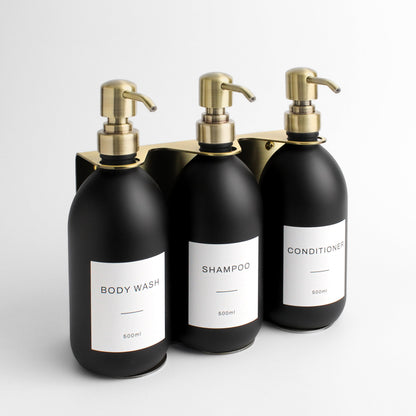 Namie Gold Wall Mounted Dispenser Bracket Set with Matte Black Bottles