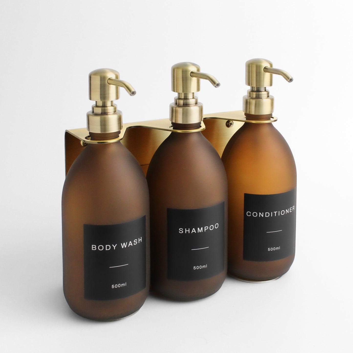 Namie Gold Wall Mounted Dispenser Bracket Set with Frosted Amber Glass Bottles