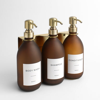 Namie Gold Wall Mounted Dispenser Bracket Set with Frosted Amber Glass Bottles