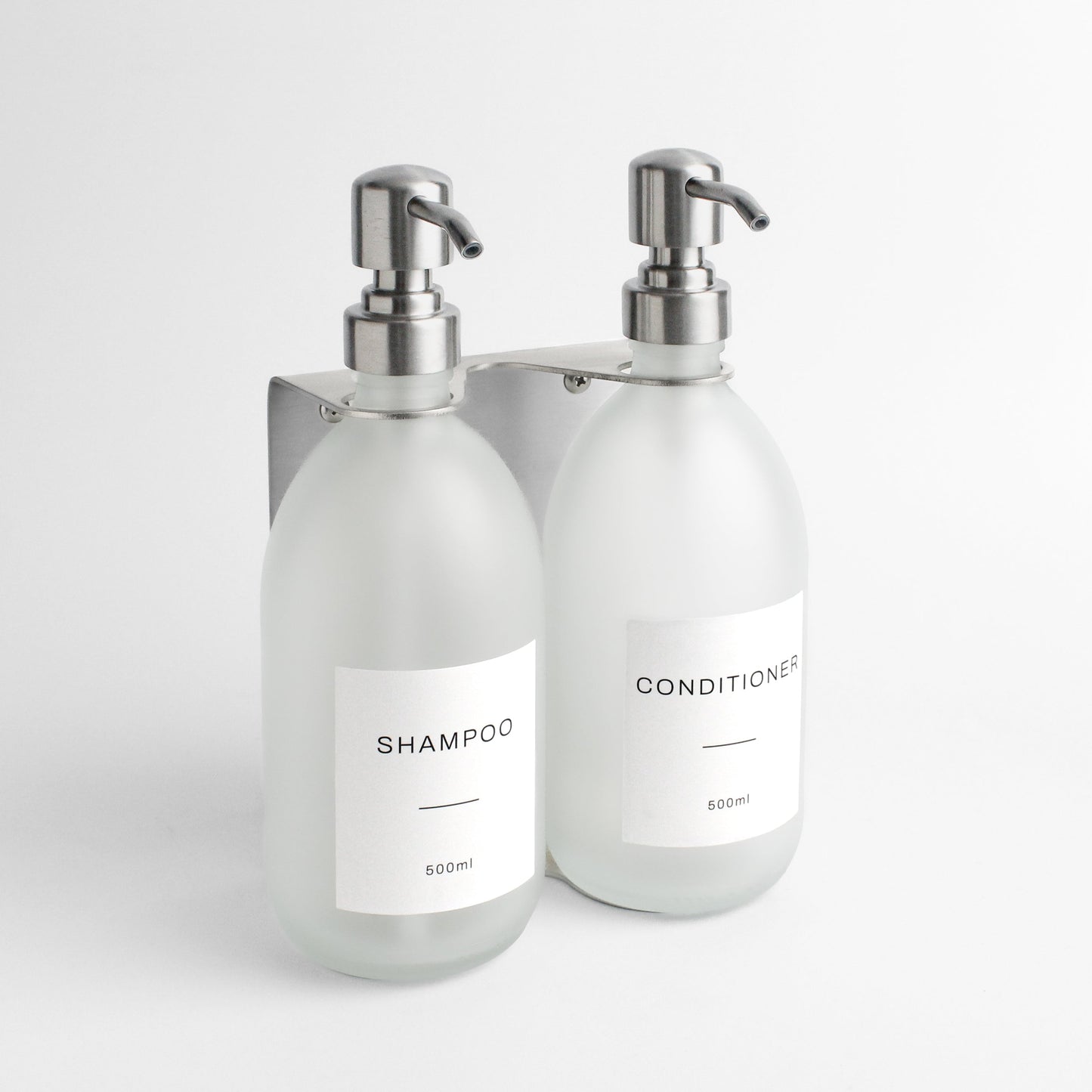 Namie Silver Wall Mounted Dispenser Bracket Set with Frosted White Glass Bottles