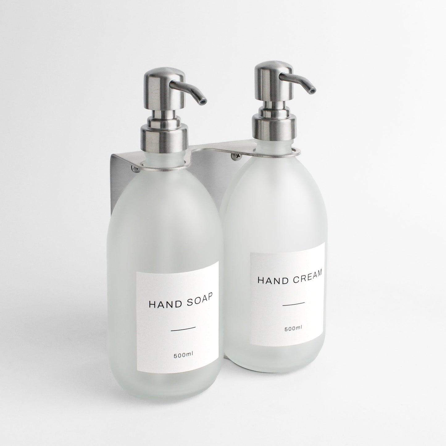 Namie Silver Wall Mounted Dispenser Bracket Set with Frosted White Glass Bottles