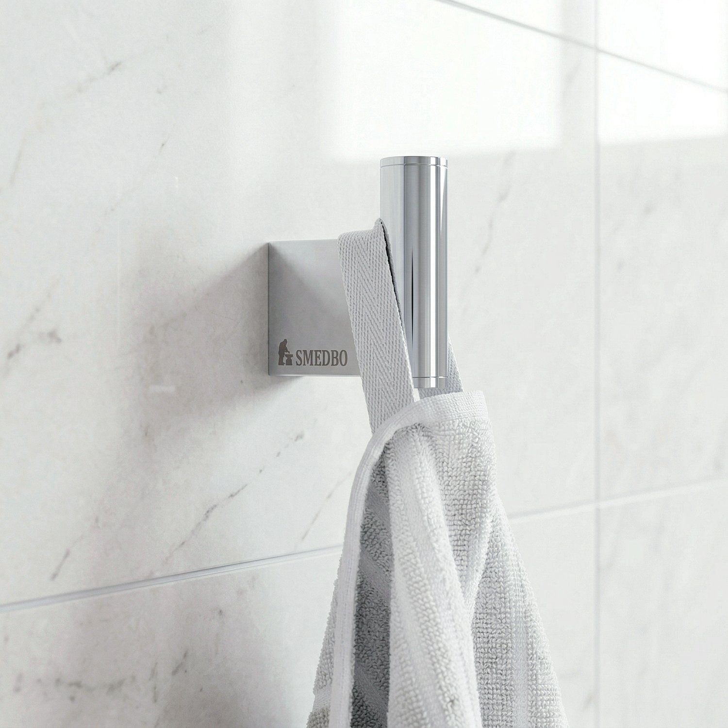 Smedbo AIR AK355 Polished Chrome Single Bathroom Hook on bathroom wall with towel
