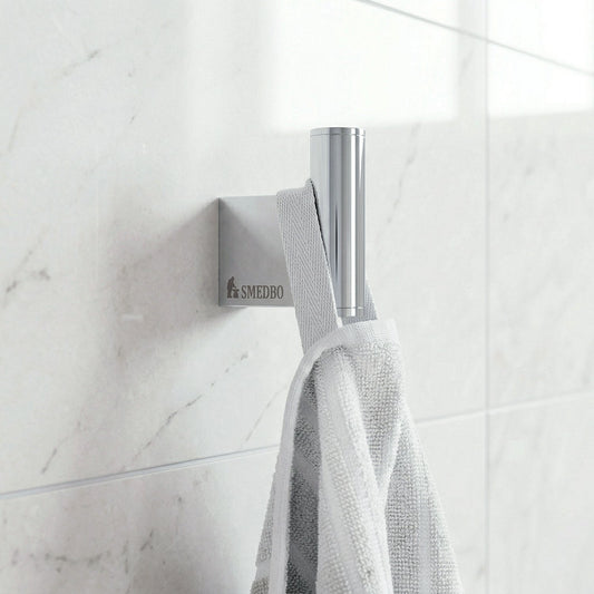 Smedbo AIR AK355 Polished Chrome Single Bathroom Hook on bathroom wall with towel