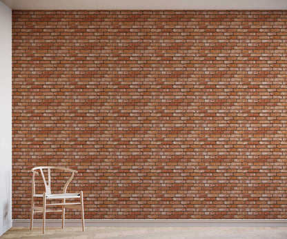 Brick wall with a chair in front