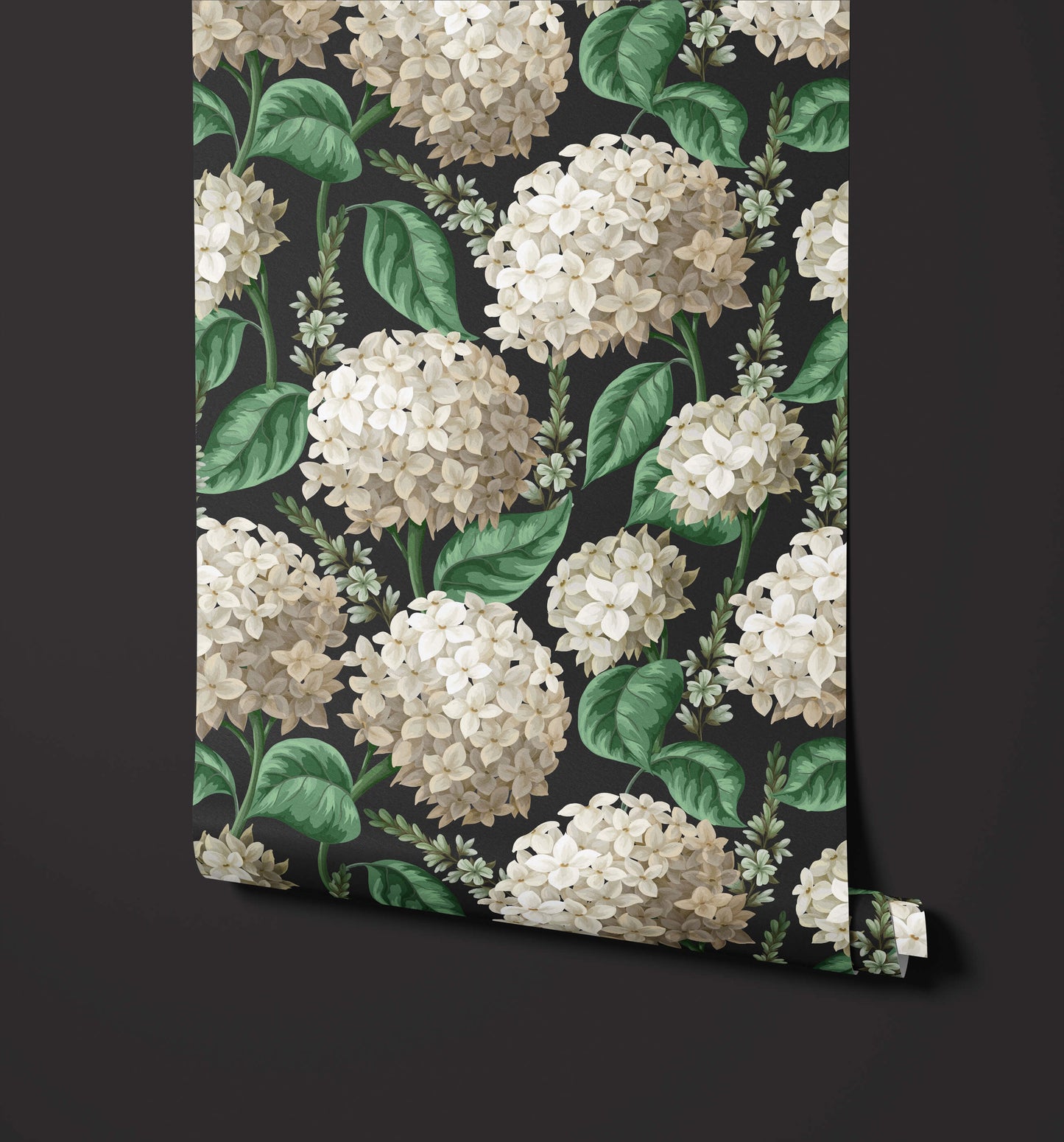 Roll of wallpaper with white hydrangea flowers and green leaves on a dark background
