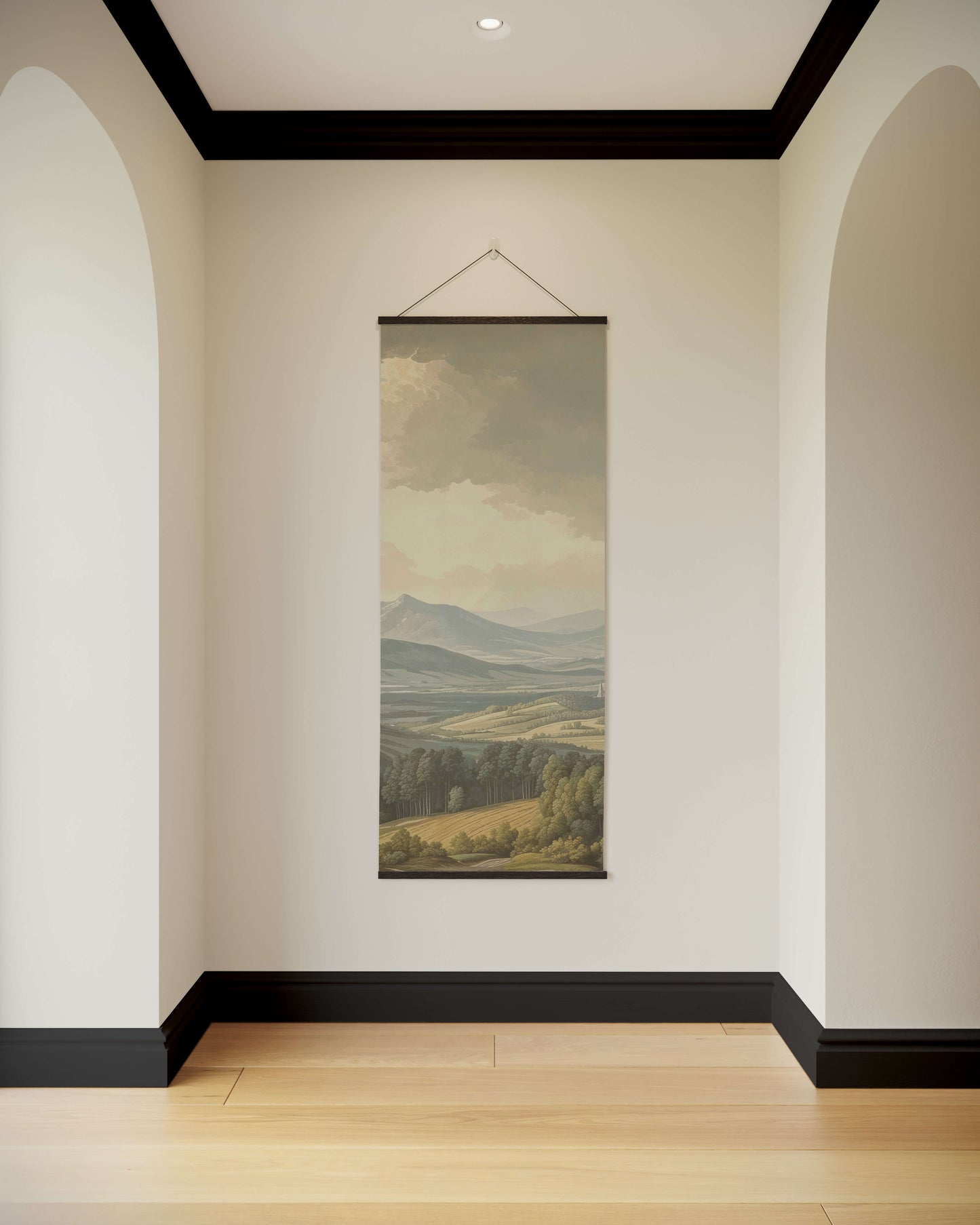 Wall art hanging in a room with arched doorways and a neutral colour scheme.