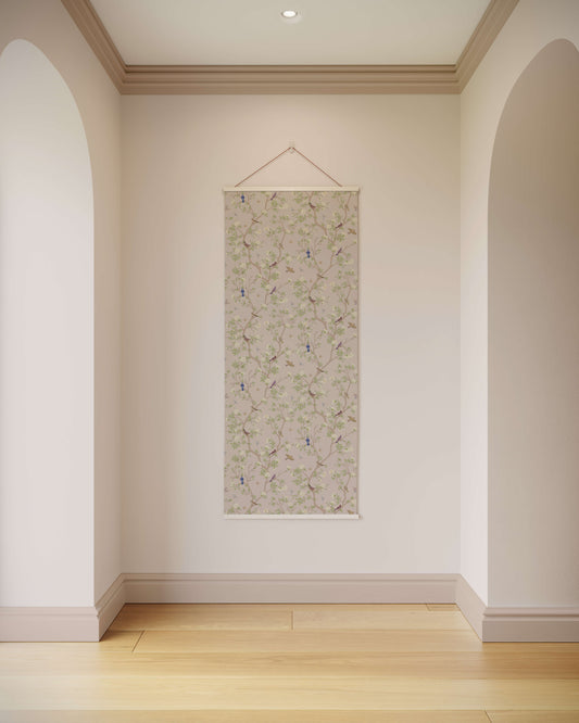 Decorative wall hanging on a plain wall with wooden flooring and arches.