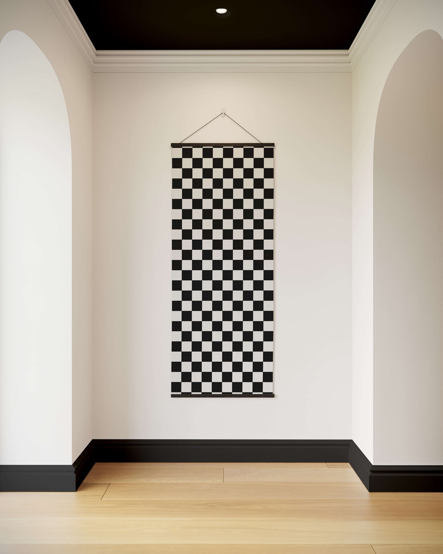 Checkerboard Pattern Tapestry hanging in a room with white walls and a wooden floor.