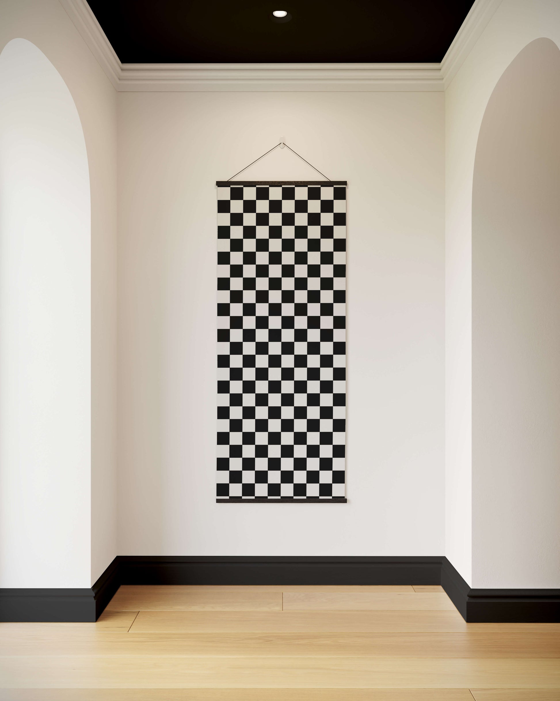 Checkerboard Pattern Tapestry hanging in a room with white walls and a wooden floor.