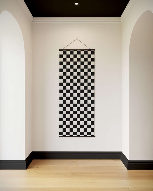 Checkerboard Pattern Tapestry hanging in a room with white walls and a wooden floor.