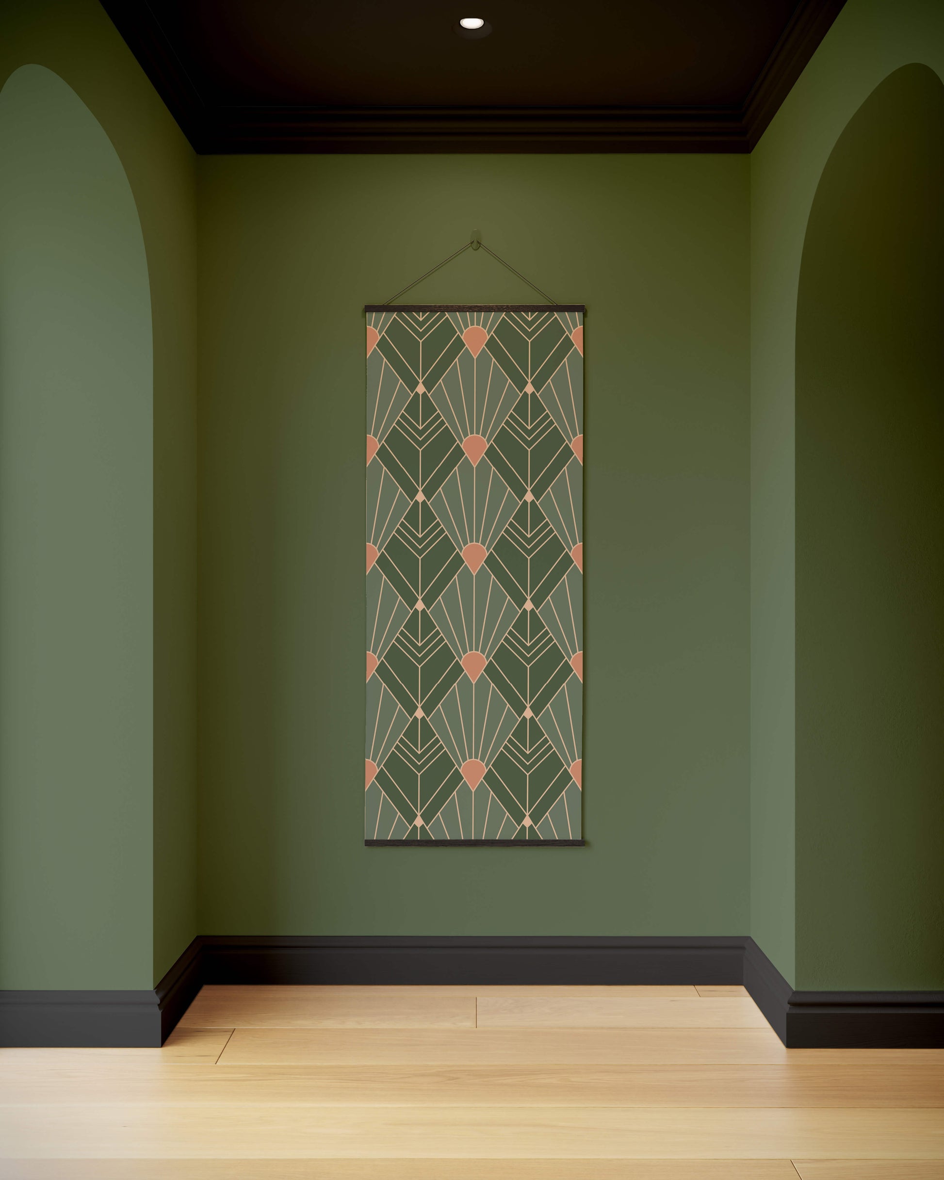 Decorative wall hanging with geometric pattern on a green wall