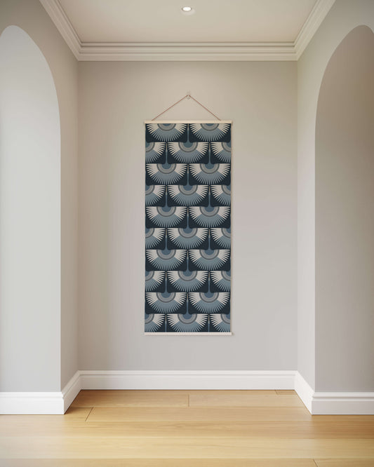 Decorative wall hanging with geometric pattern on a plain wall.