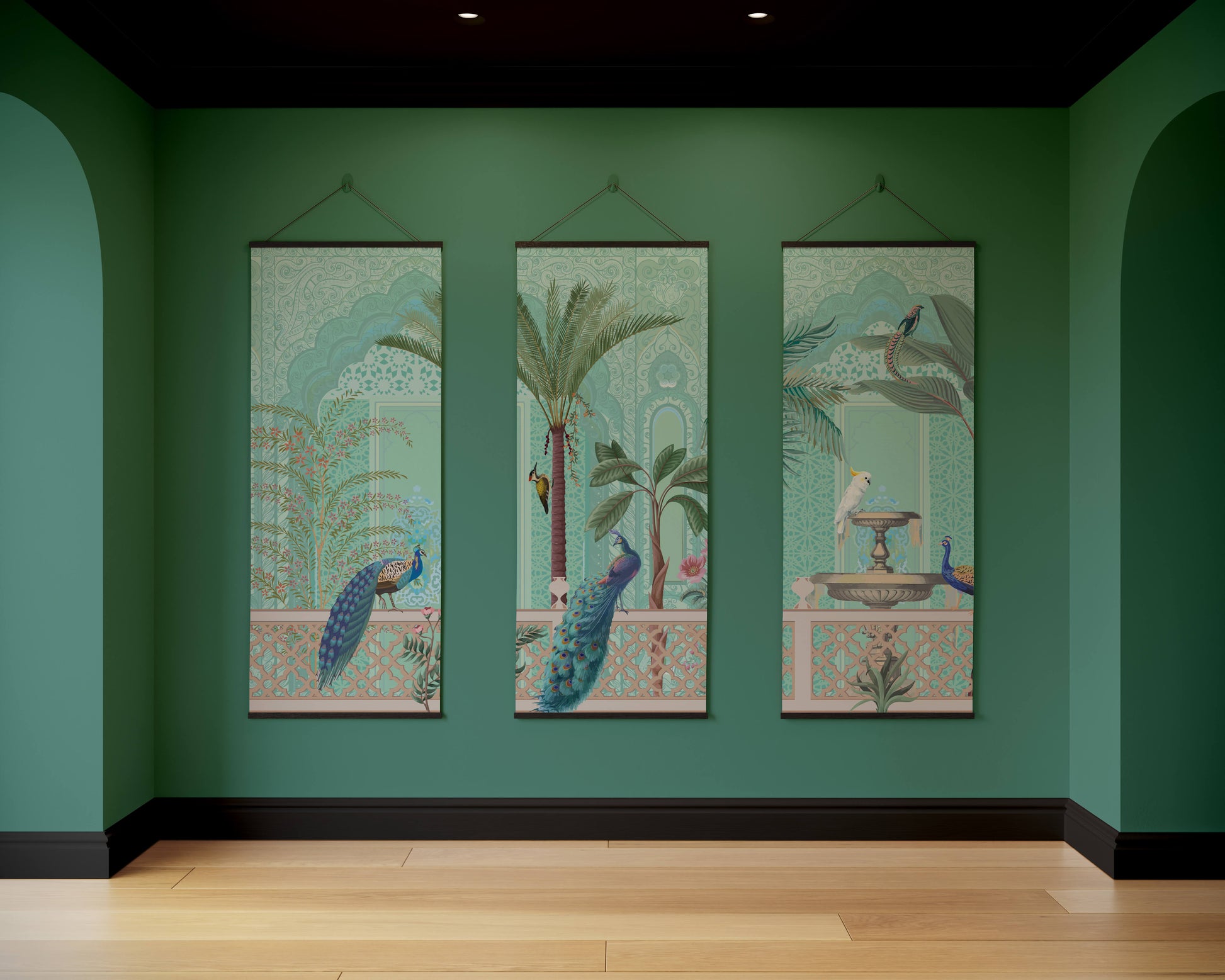 Three decorative wall hangings on a green wall with wooden floor.