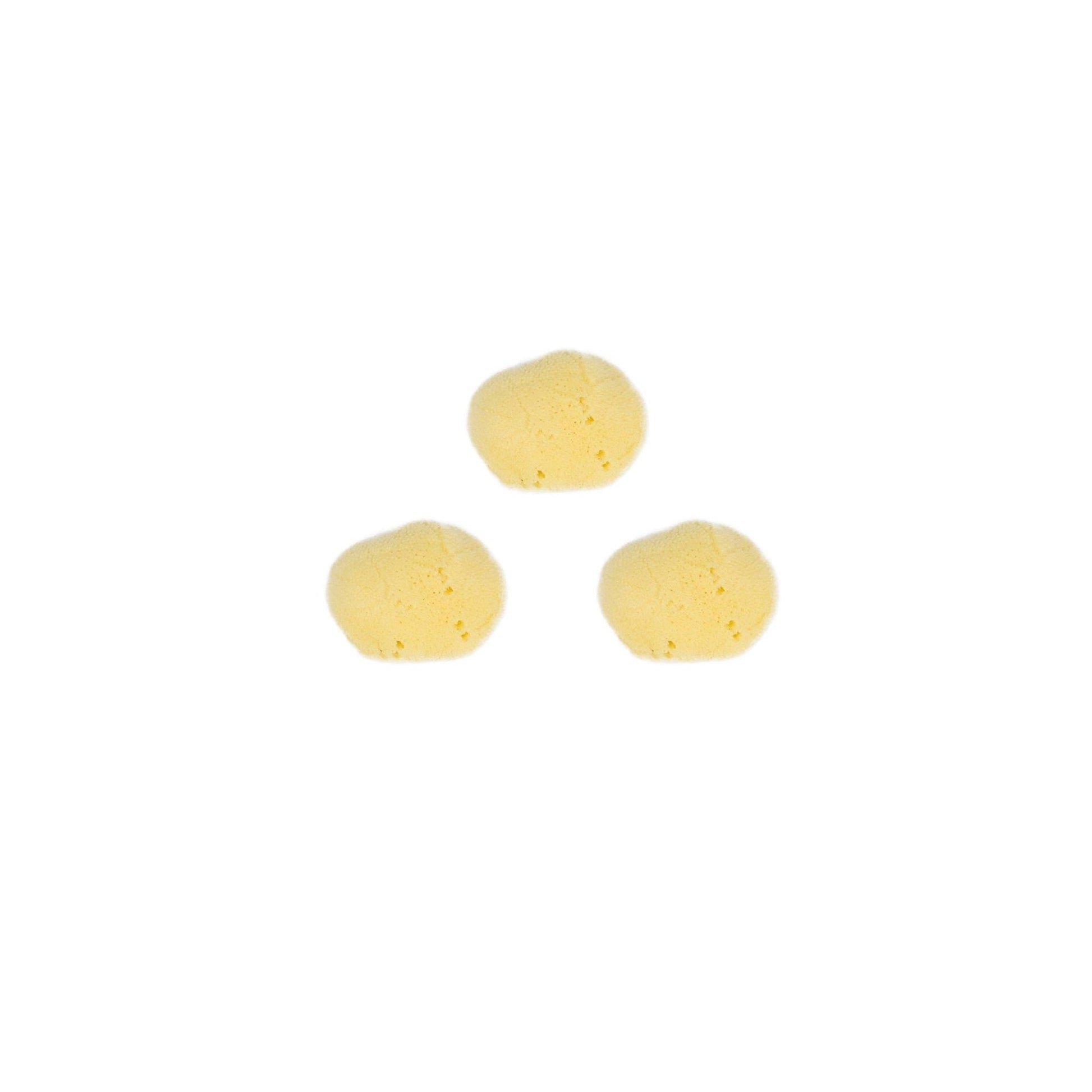 Three yellow sponges on a white background