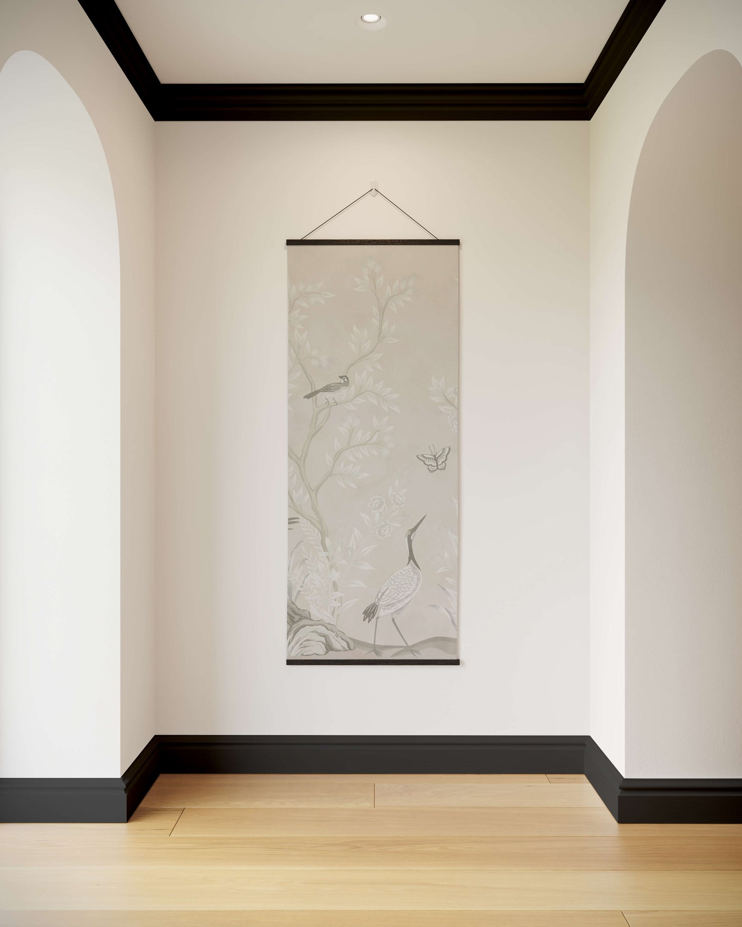Decorative wall hanging in a room with white walls and wooden flooring
