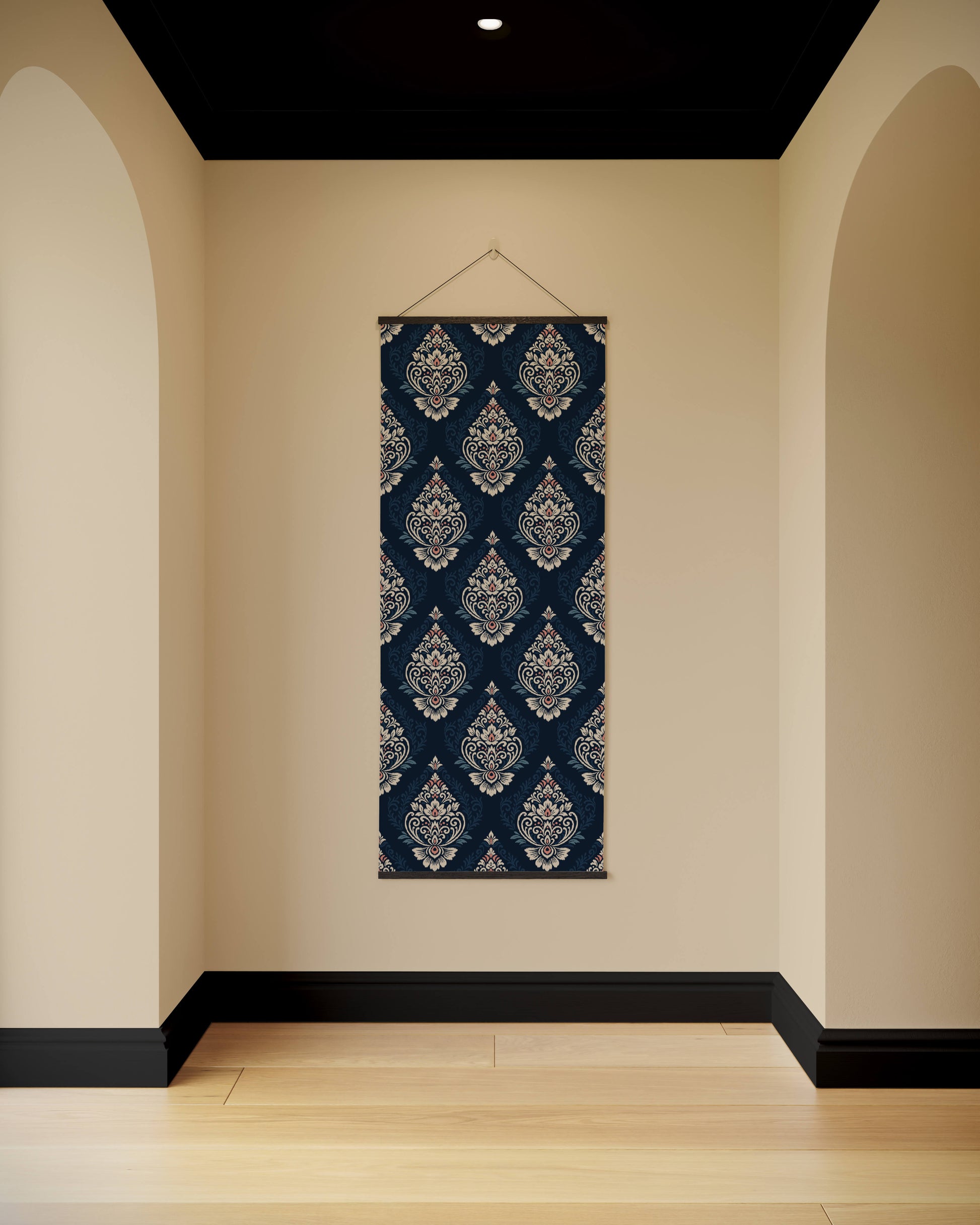 Decorative wall hanging with blue and white pattern on a beige wall.