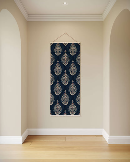 Decorative tapestry with a blue and white pattern hanging on a beige wall.
