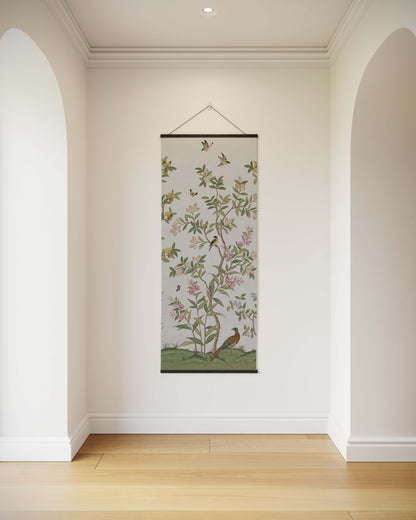 Decorative wall hanging with floral and bird design in a hallway.
