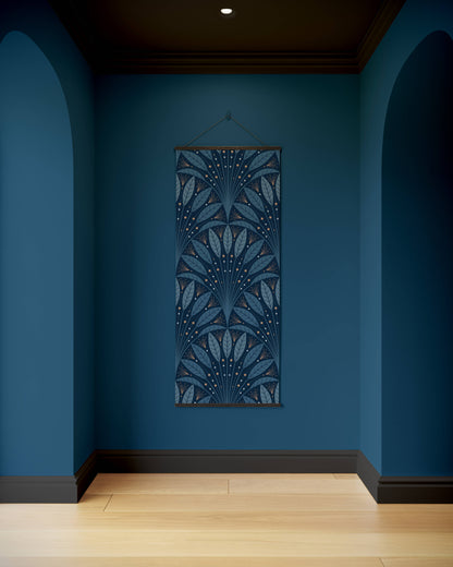Decorative blue tapestry hanging on a blue wall with wooden floor and arches.