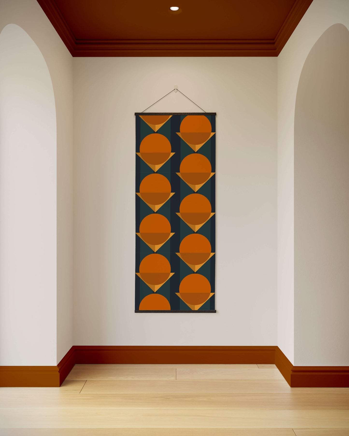 Decorative wall hanging with geometric pattern on a white wall.