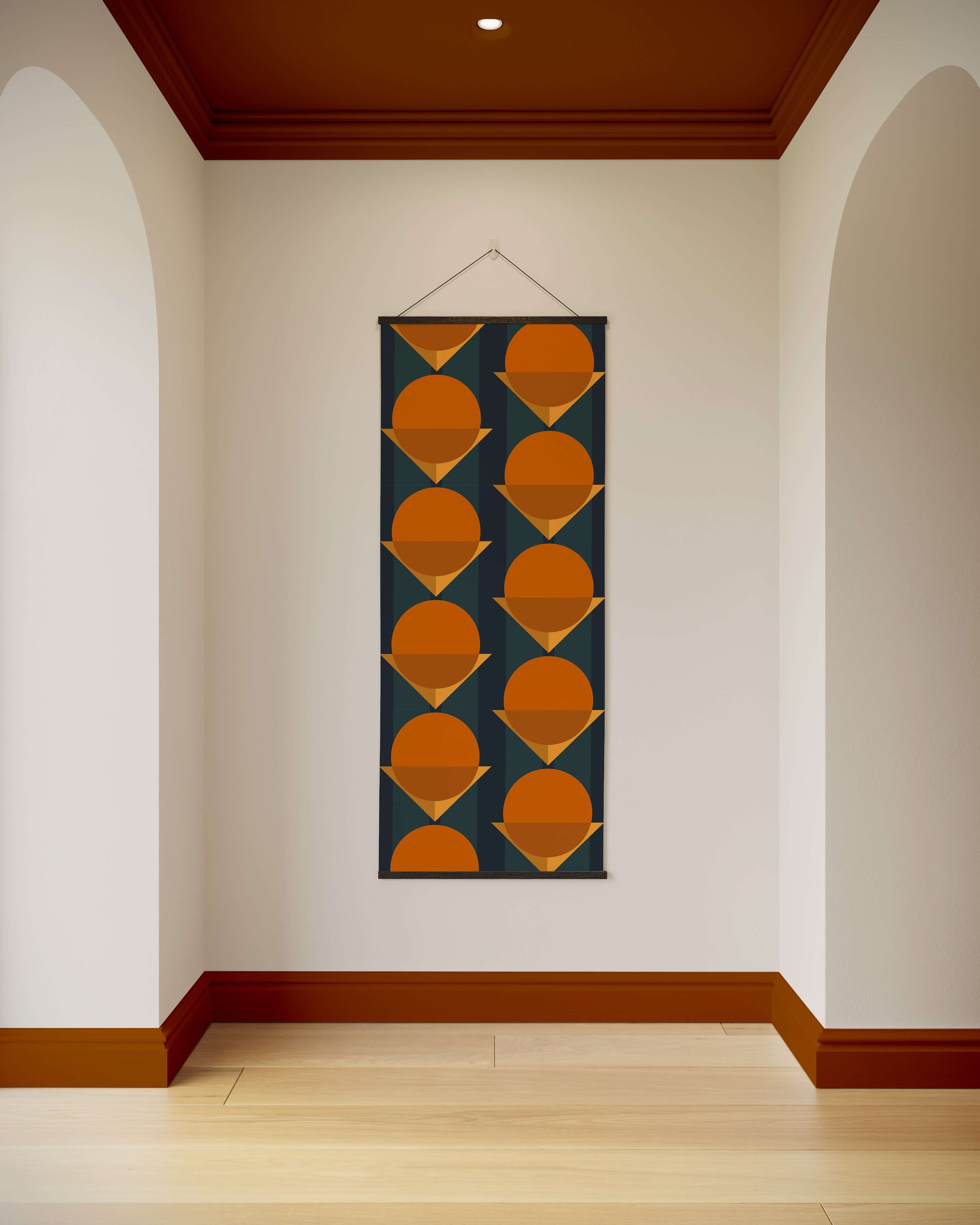 Decorative wall hanging with geometric pattern on a white wall.