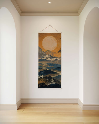 Traditional Japanese scroll hanging on a wall in a room with wooden flooring.