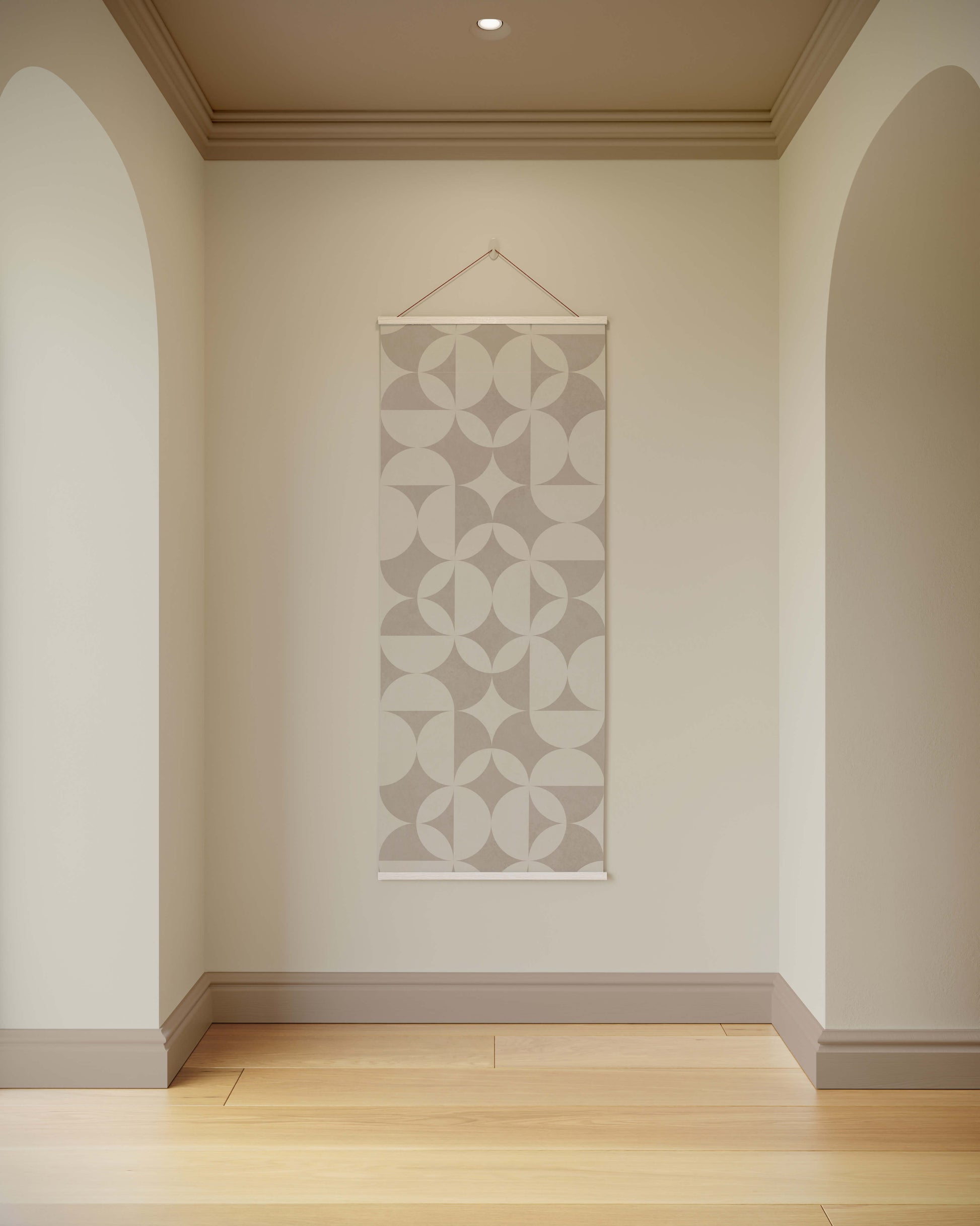 Decorative wall hanging with geometric pattern on a plain wall.