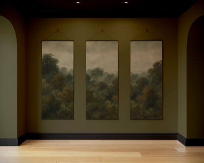 Three large landscape paintings hanging on a wall in a dark room.