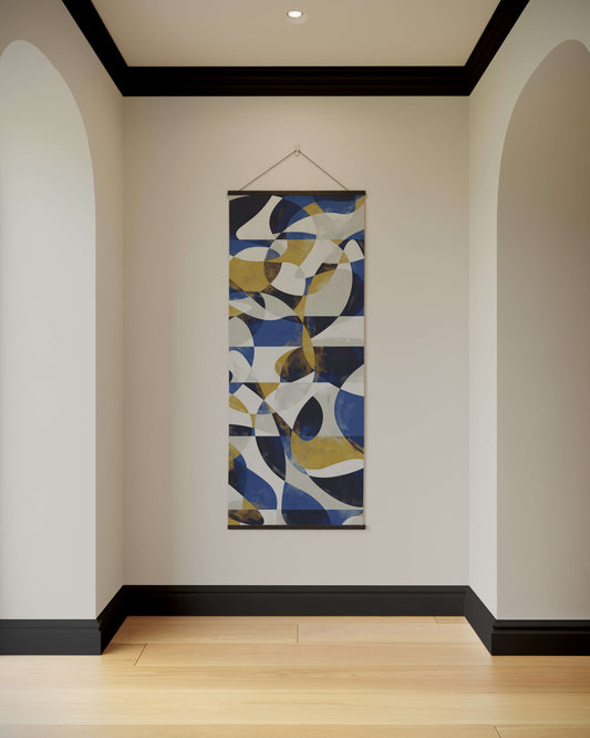 Abstract wall art hanging on a white wall with a wooden floor and black baseboard.