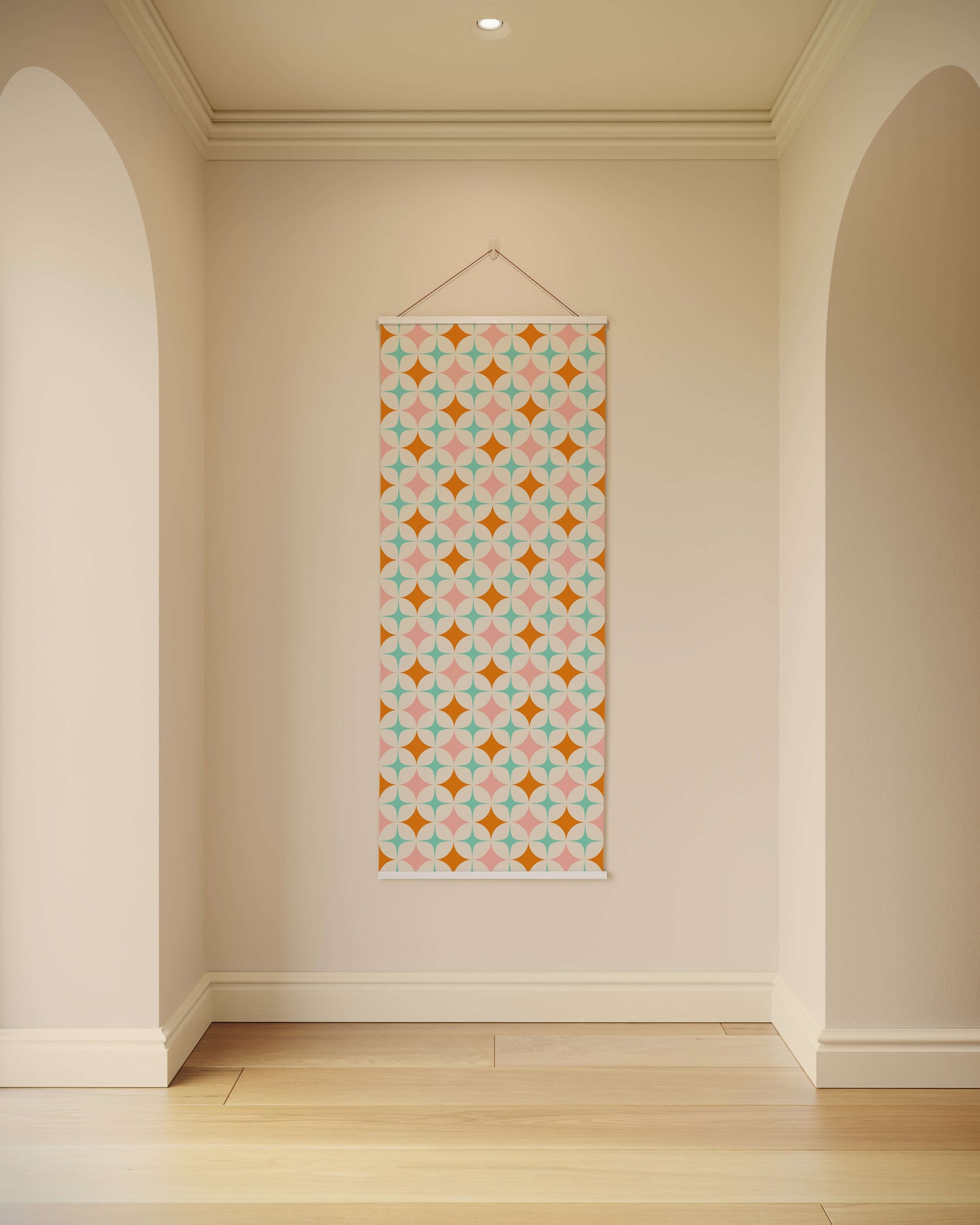 Decorative wall hanging with geometric pattern on a plain wall.