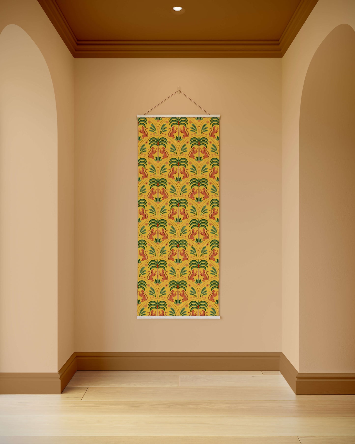 Decorative wall hanging with a colourful pattern on a beige wall.