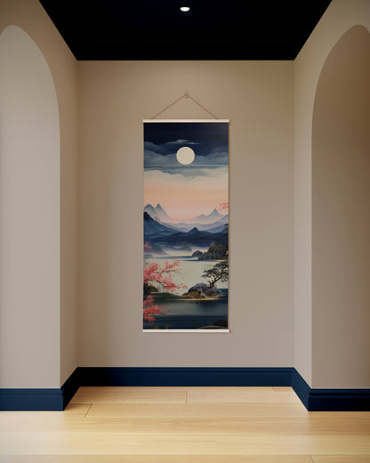 Wall art of a mountain landscape with a full moon hanging on a wall.