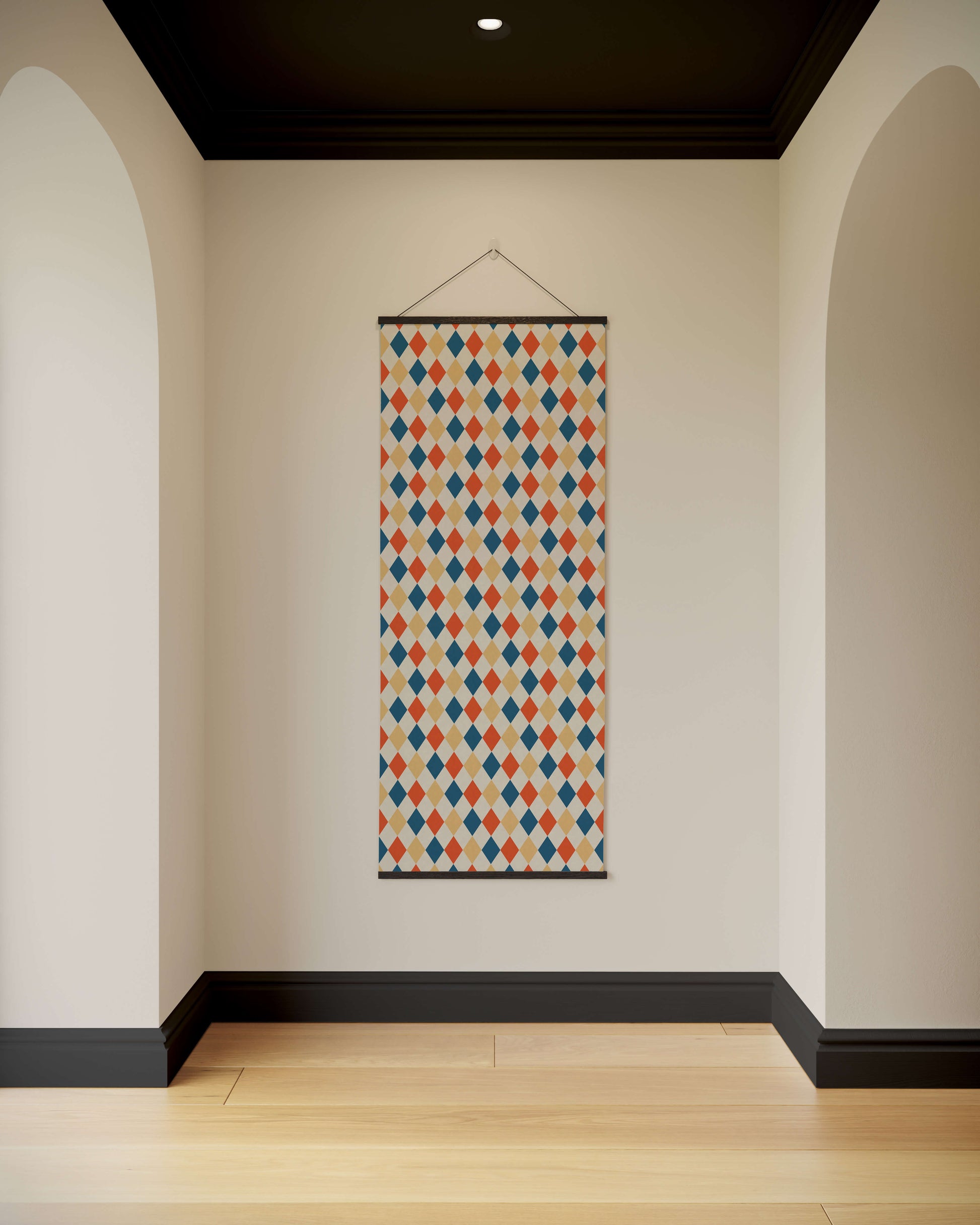 Decorative wall hanging with a geometric pattern on a plain wall.