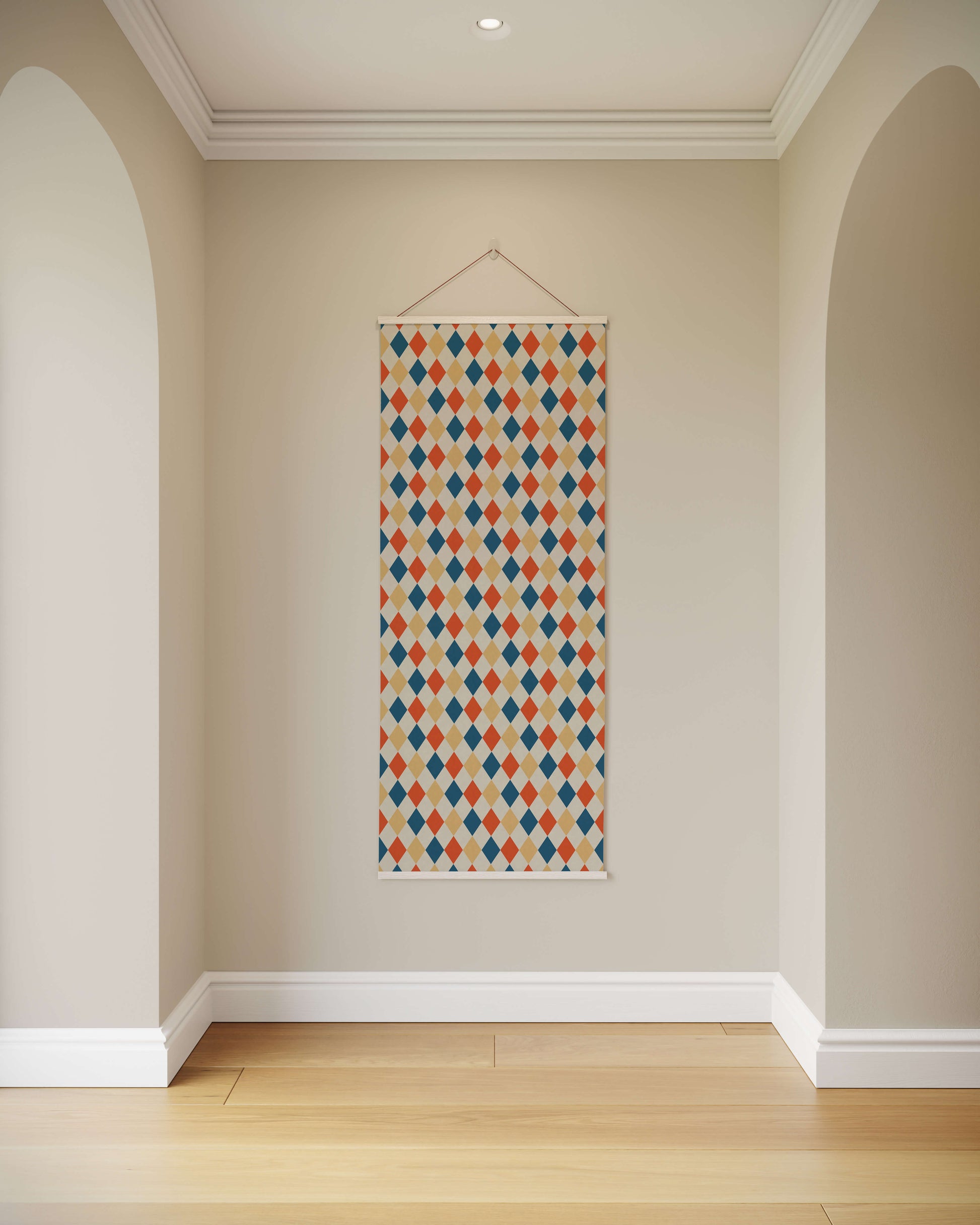 Decorative wall hanging with a geometric pattern on a plain wall.