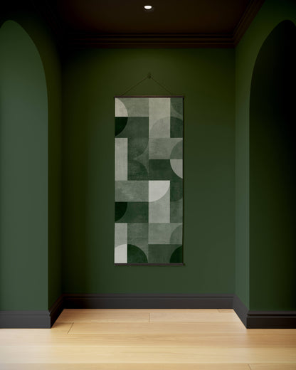 Abstract geometric wall art on a green wall with wooden floor