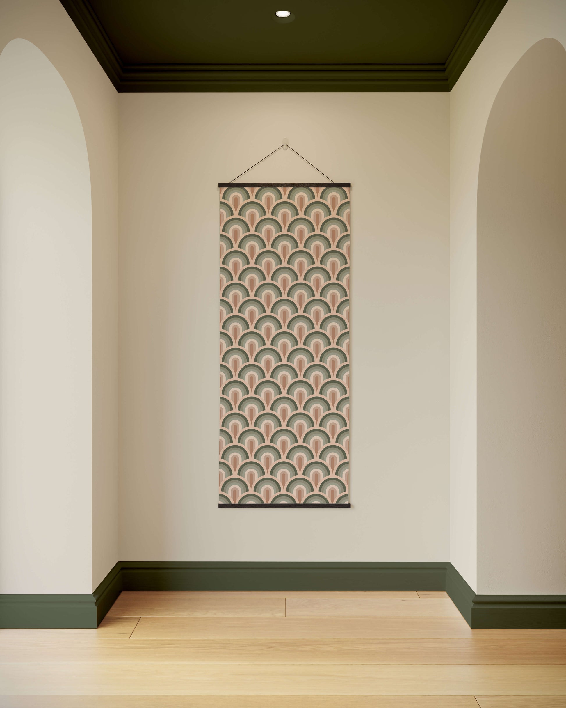 Decorative wall hanging with geometric pattern in a room with arched doorways and a wooden floor.