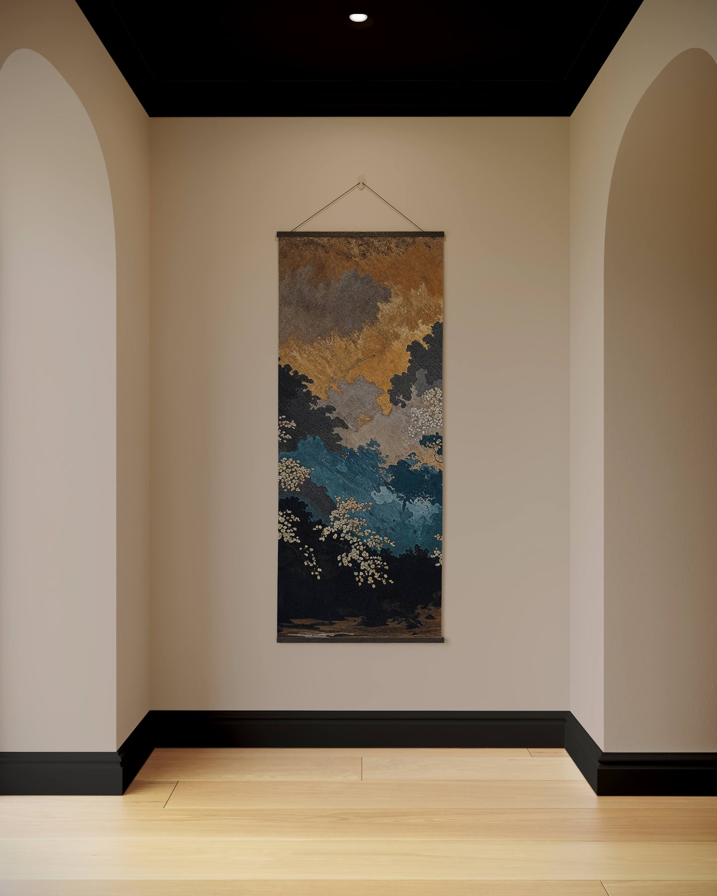 Abstract wall tapestry hanging in a room with arches and a neutral color palette.