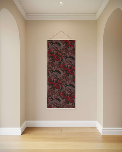 Decorative tapestry with a blue and white pattern hanging on a beige wall.