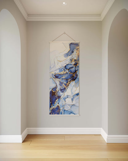 Abstract art hanging on a wall in a room with wooden flooring