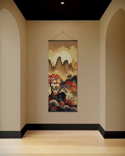 Decorative wall scroll with mountain and tree design hanging on a beige wall.