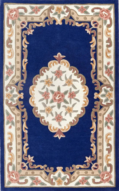 Decorative rug with floral pattern and ornate border on a blue background