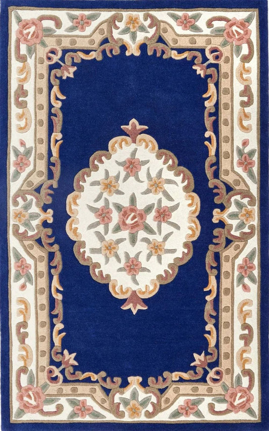 Decorative rug with floral pattern and ornate border on a blue background