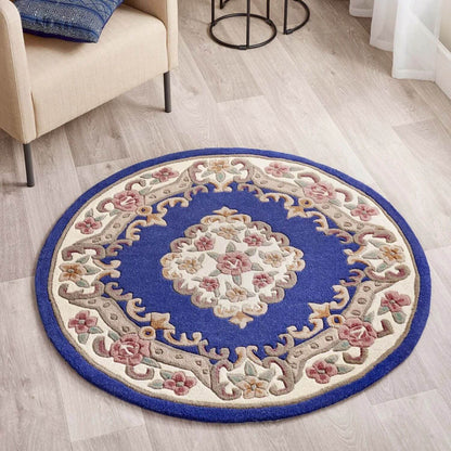 Round decorative rug with floral patterns on a wooden floor