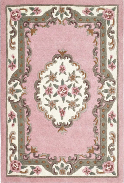 Decorative rug with floral patterns on a pink background