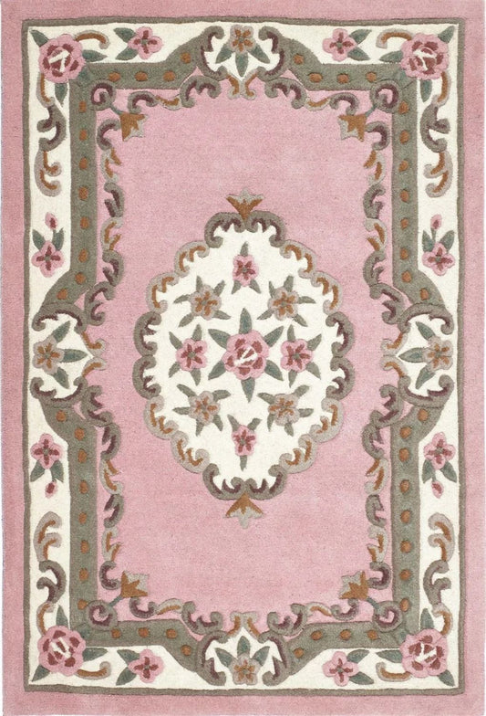 Decorative rug with floral patterns on a pink background