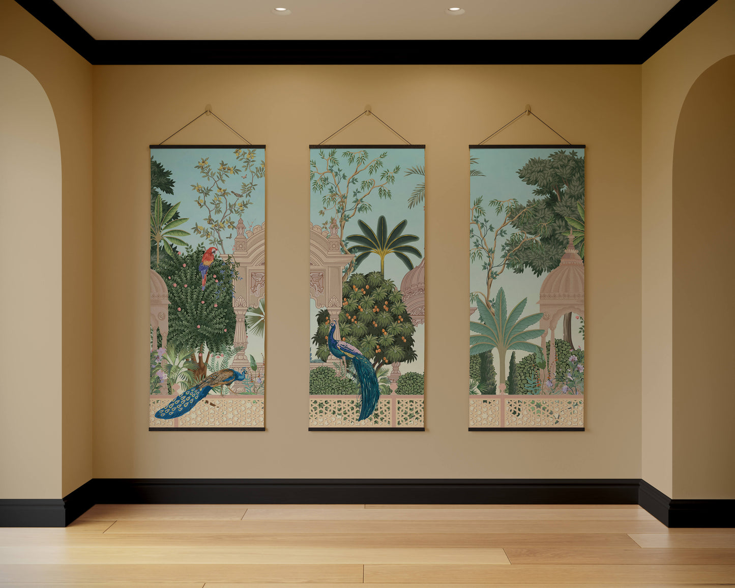 Three vertical wall hangings with nature-themed artwork on a beige wall.