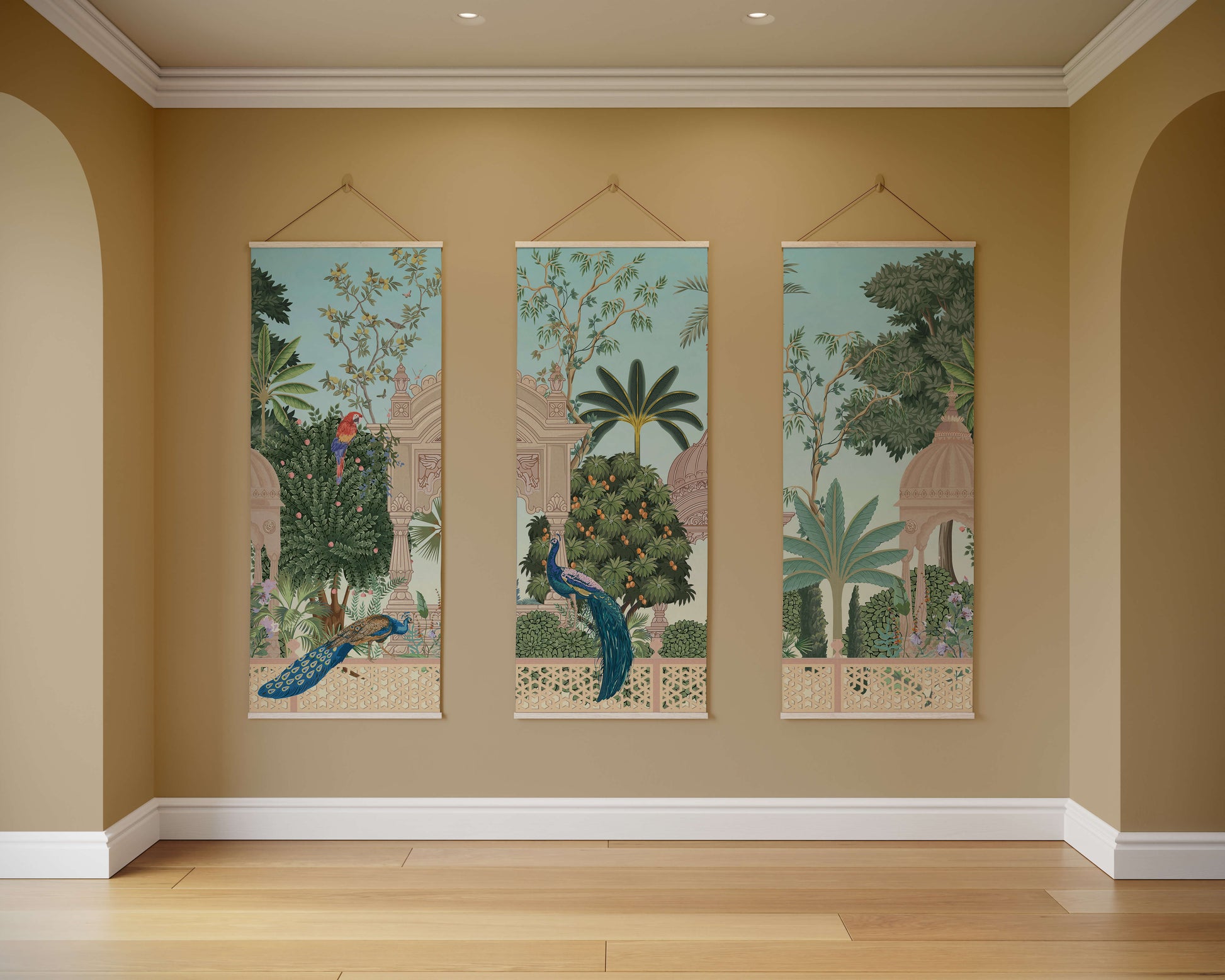 Three decorative wall hangings with nature-themed designs on a beige wall.